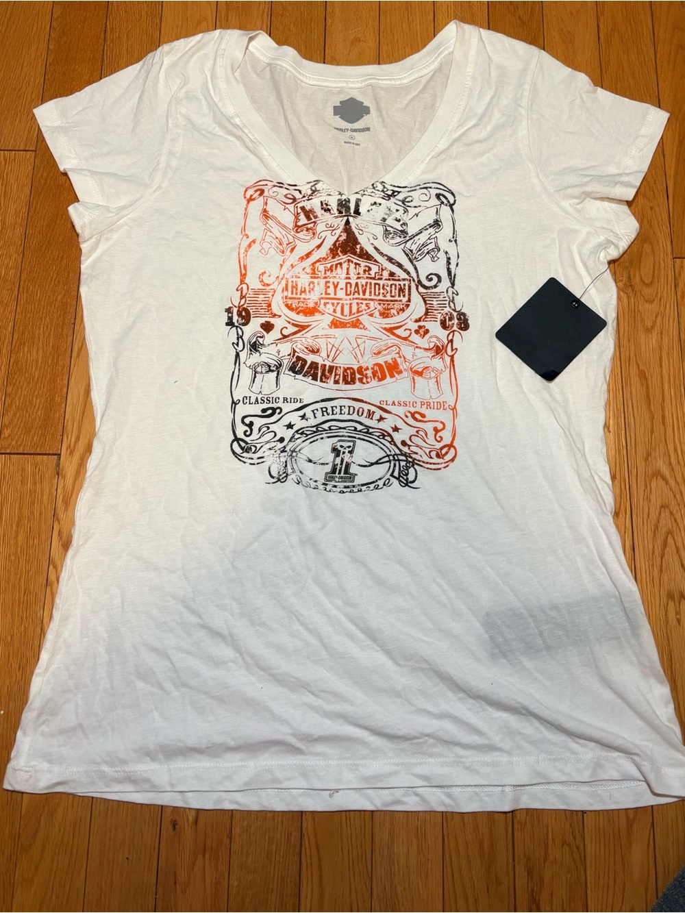 Harley-Davidson White V‑Neck Tee with Orange & Black Graphic